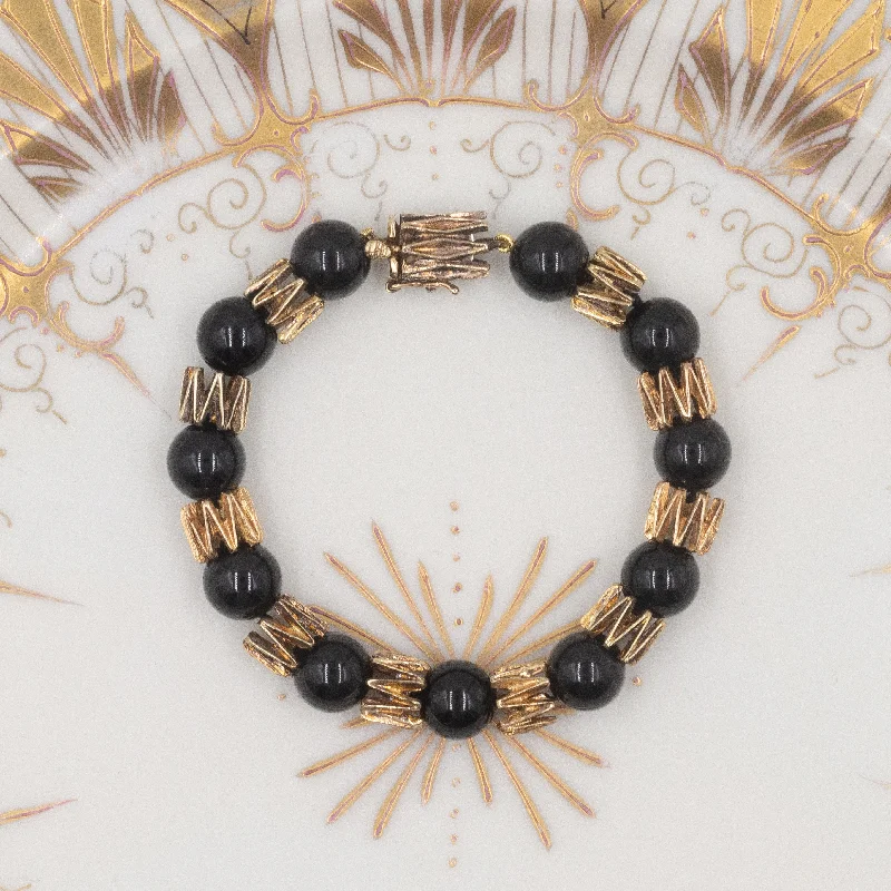 Enamel flower bracelet-Onyx and Gold Bracelet c1980