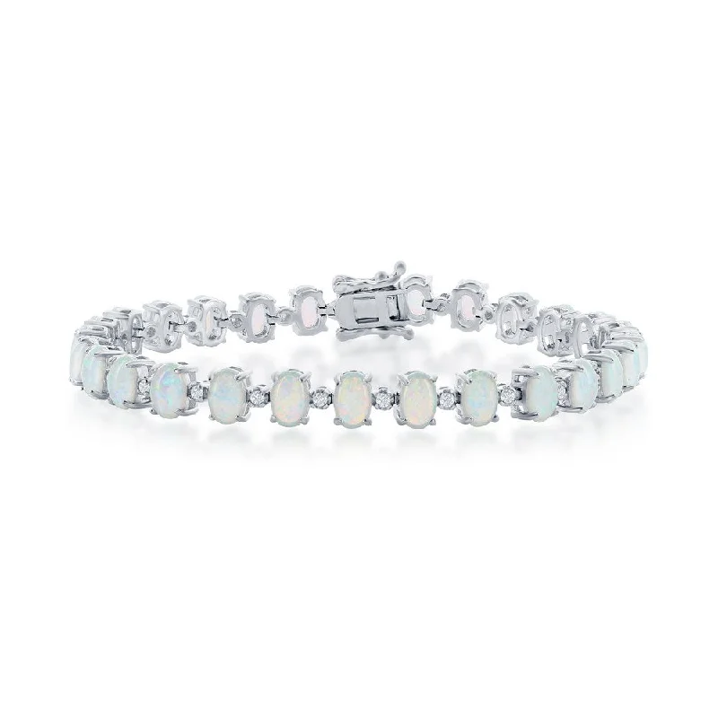 Oval garnet bracelet-Sterling Silver Alternating Oval White Opal & Small CZ Tennis Bracelet